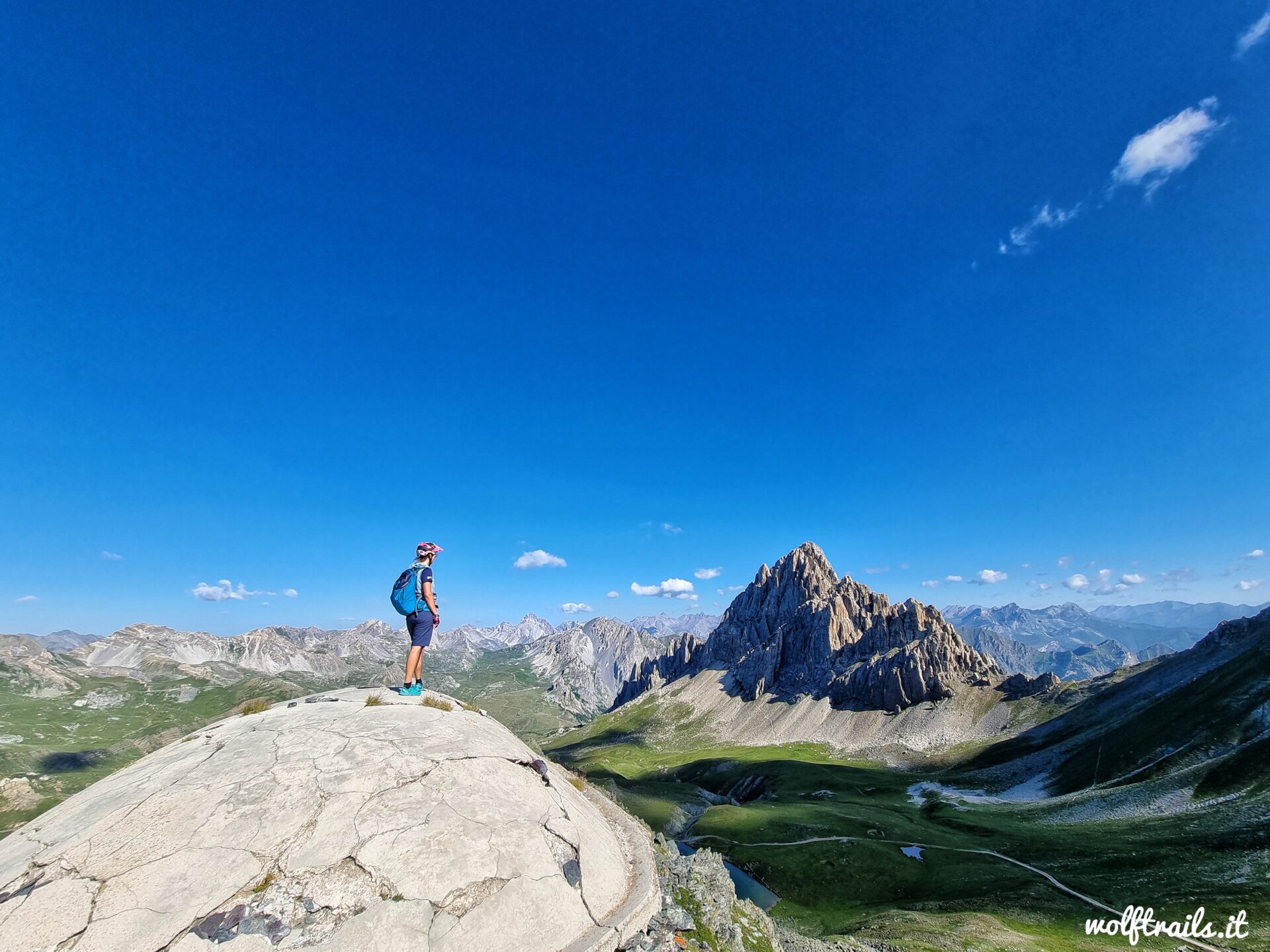 Mountain Biker overlooking Rocca la Meja on the Gardetta Plateau