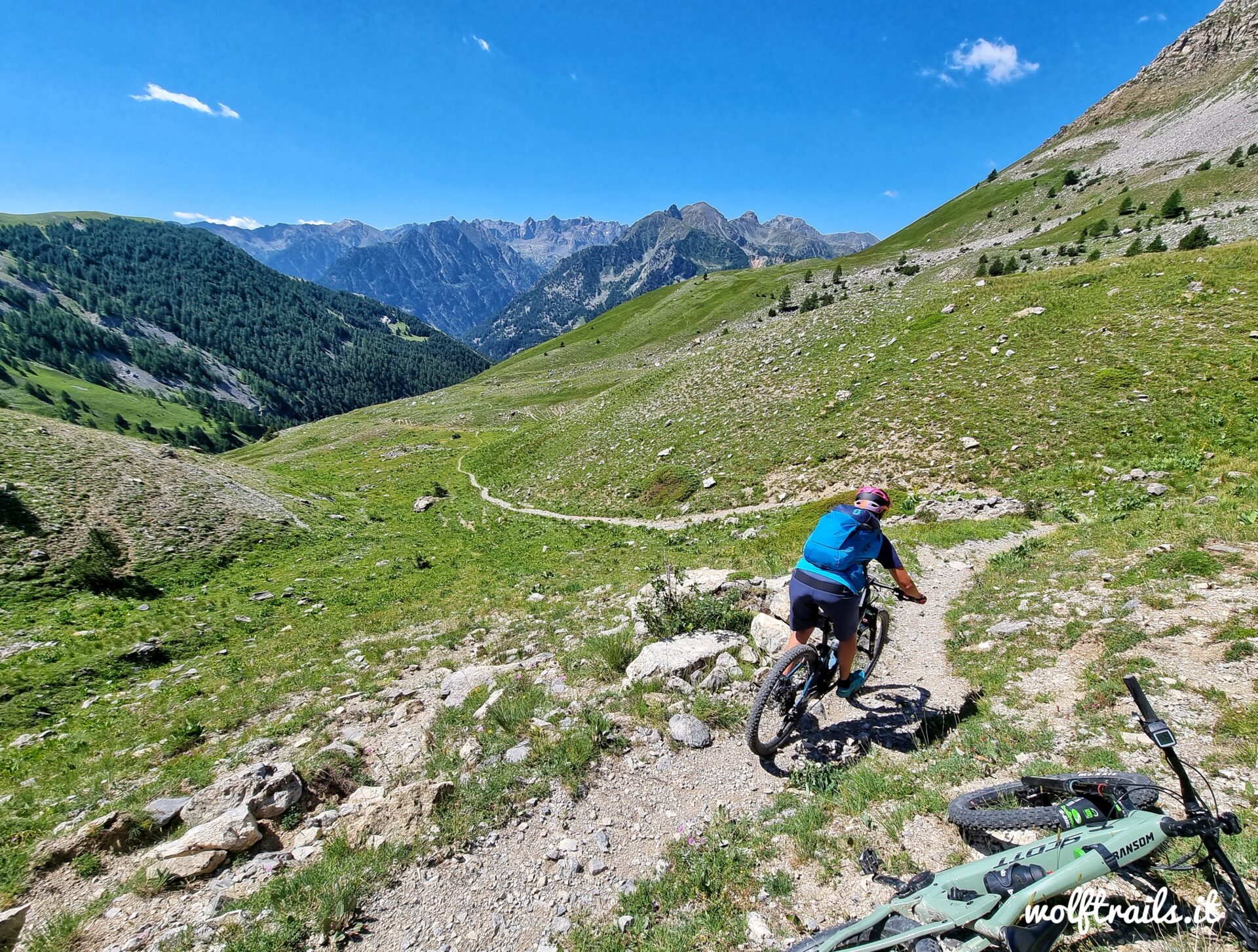 Mountain biker riding a natural singletrack in Valle Stura