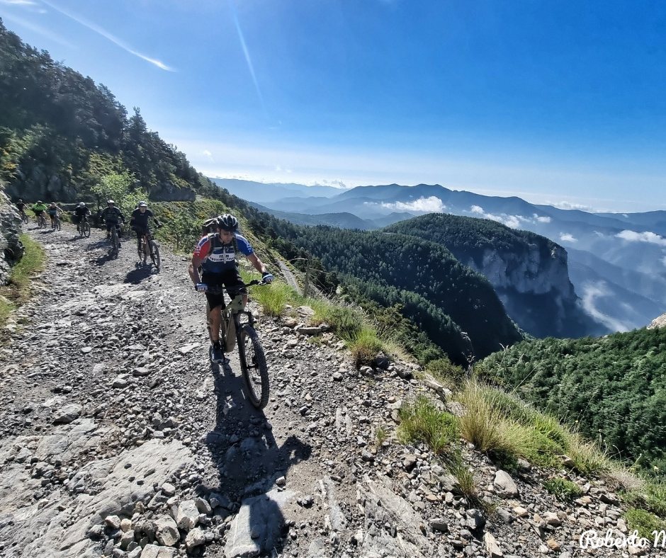 a group of enduro MTB riders during western Liguria traverse