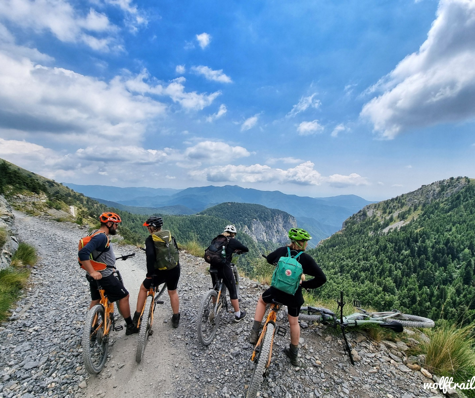 Group of mountain bikers riding the Alta Via del Sale in the Western Alps