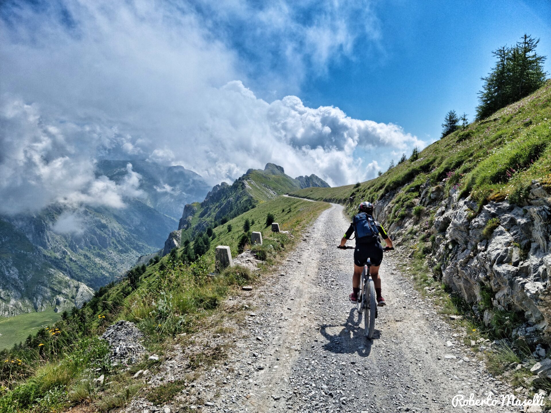 Mountain biker riding Alta Via del Sale in the Western Alps