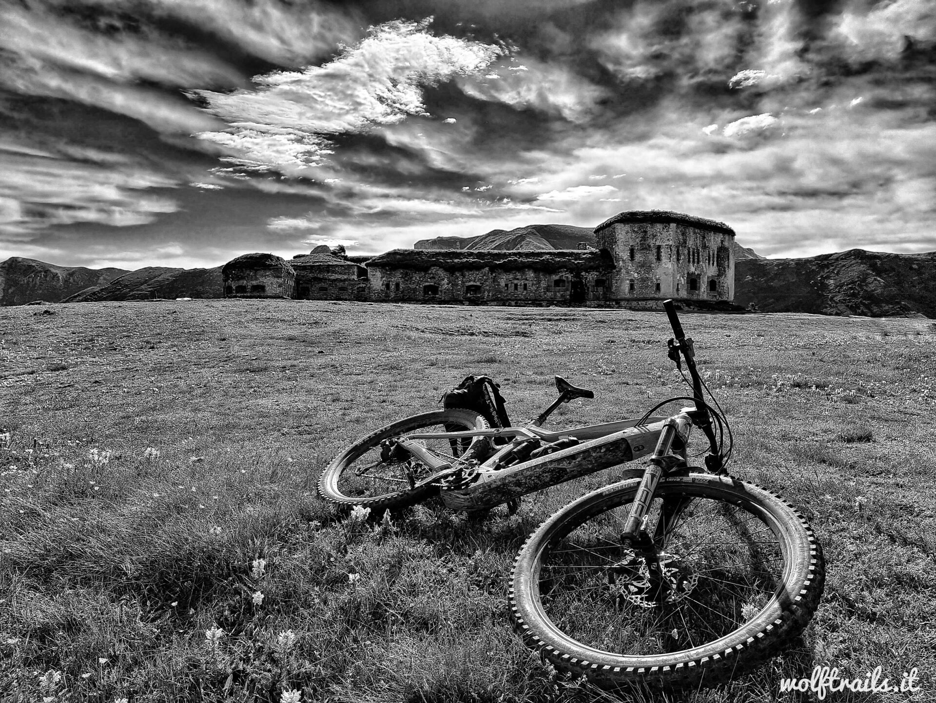 e-MTB Leaning in front of the historical Forte Colle Alto/Forte Centrale at Colle di Tenda