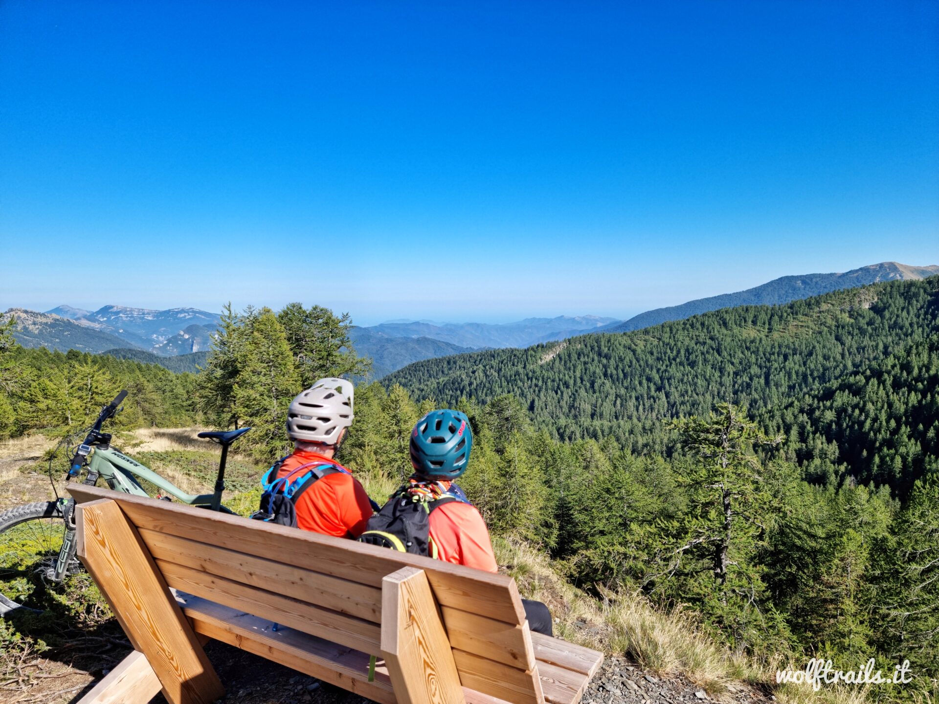 Mountain bikers taking a pause on Alta Via del Sale