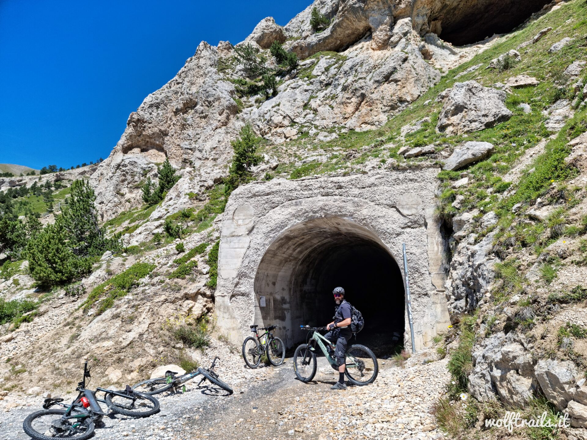 Mountain biker at the Galleria dei Saraceni (Seguret Tunnel) on the historic Jafferau military road above Bardonecchia
