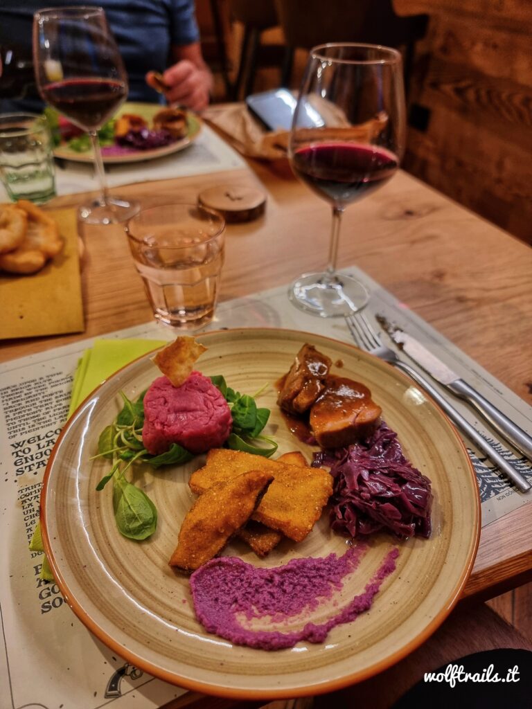 Fried porcini mushrooms, roast meat and Fassona beef tartare with Barbera d’Alba wine at La Briga restaurant during an Alta Via del Sale MTB tour