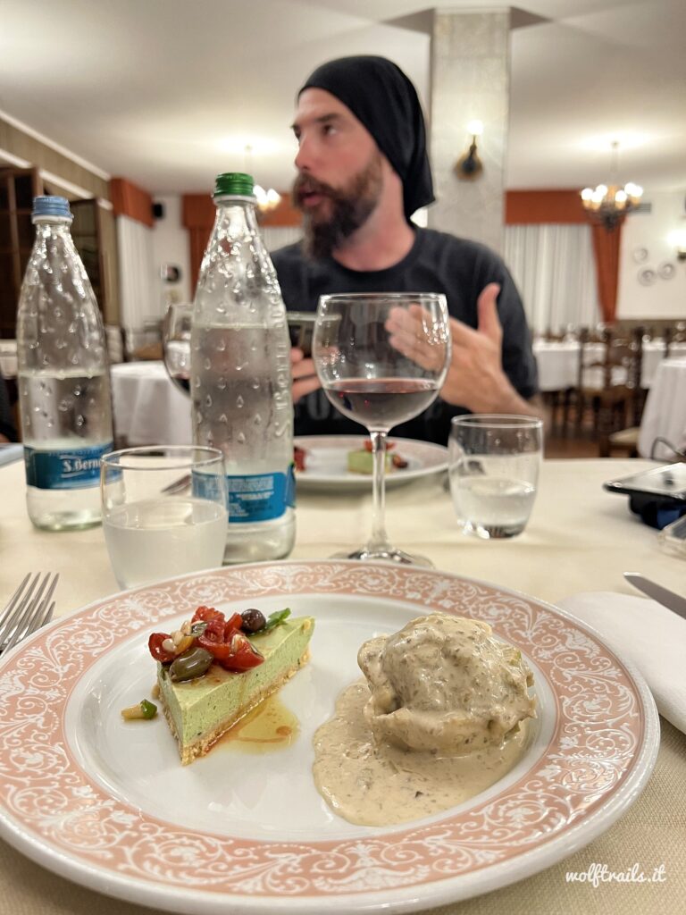 WolfTrails guide Roberto Maselli dining at a local restaurant during an Alta Via del Sale MTB tour